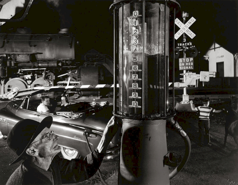 GAS PUMP AND THE RAILROAD AT VESUVIUS, VIRGINIA Vesuvius, Virginia, 1956 © O. Winston Link / O. Winston Link Museum, Roanoke, Virginia