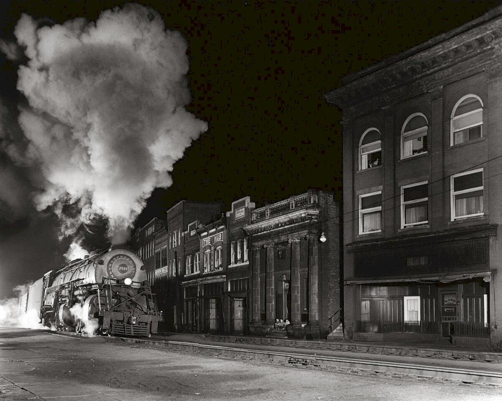 MAIN LINE ON MAIN STREET, NORTH FORK, WEST VIRGINIA North Fork, West Virginia, 1958 © O. Winston Link / O. Winston Link Museum, Roanoke, Virginia