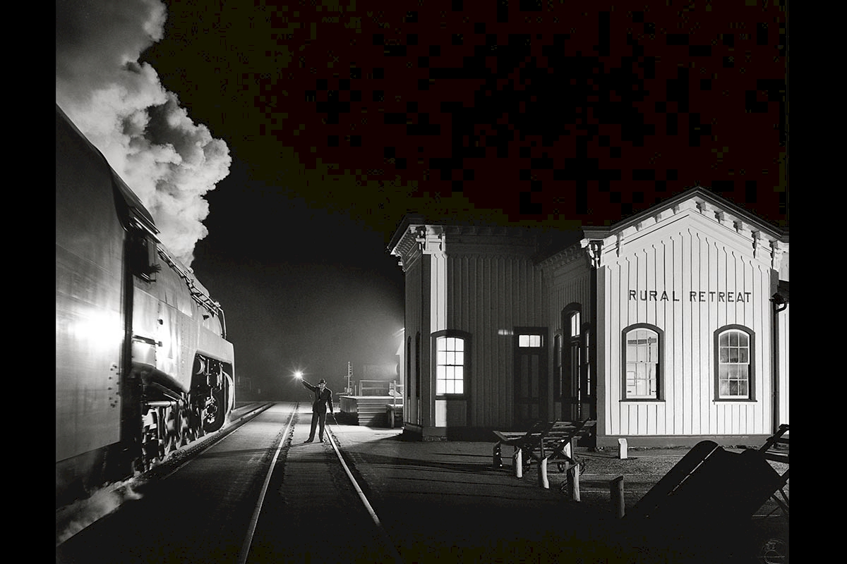 TRAIN NO. 17, THE BIRMINGHAM SPECIAL, MOVING WEST, GETS A HIGHBALL AT RURAL RETREAT, VIRGINIA; Rural Retreat, Virginia, 1957  © O. Winston Link / O. Winston Link Museum, Roanoke, Virginia