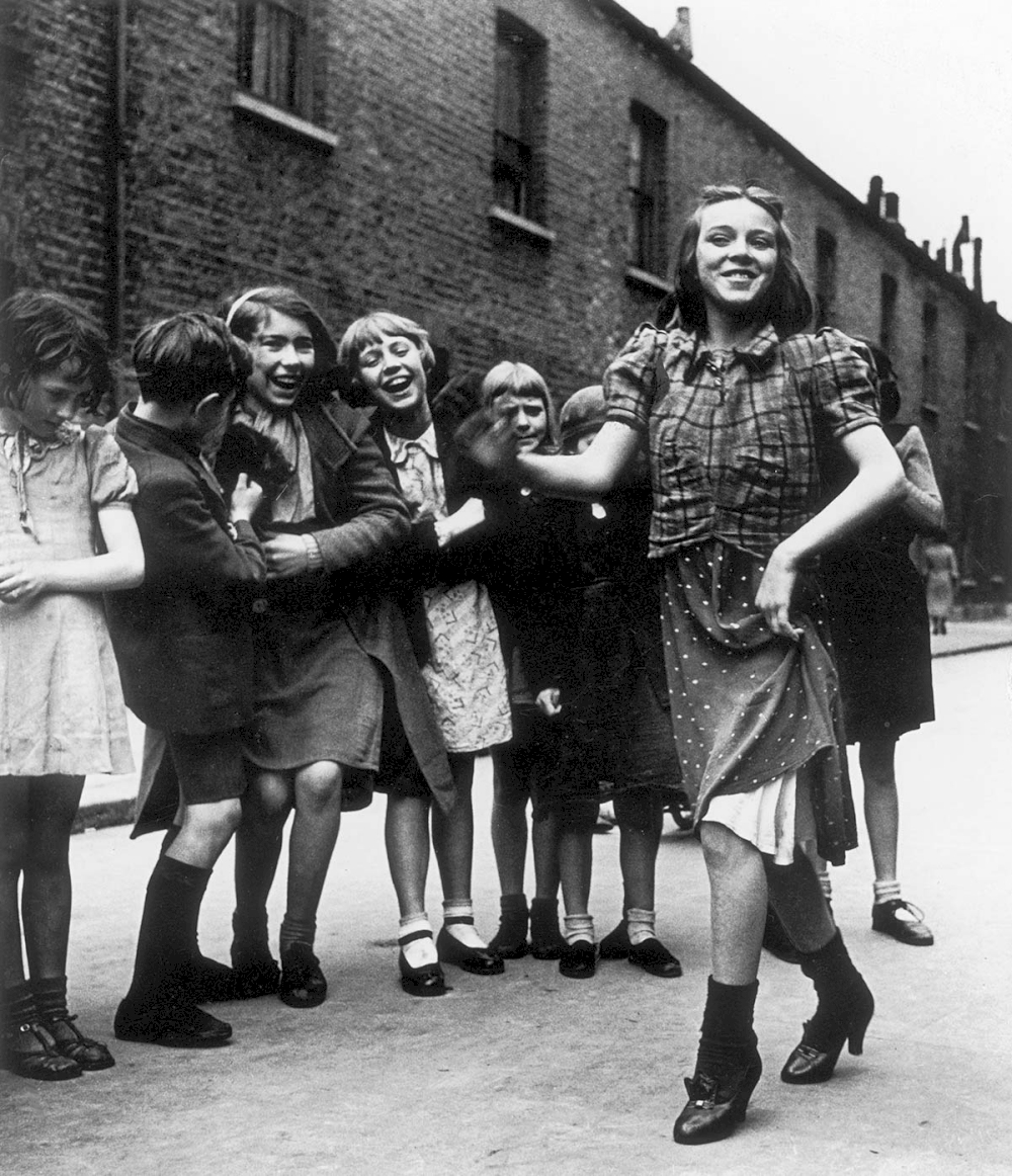 East End girl dancing the ‘Lambeth Walk’, 1939 - Private collection, Courtesy Bill Brandt Archive and Edwynn Houk Gallery © Bill Brandt / Bill Brandt Archive Ltd.